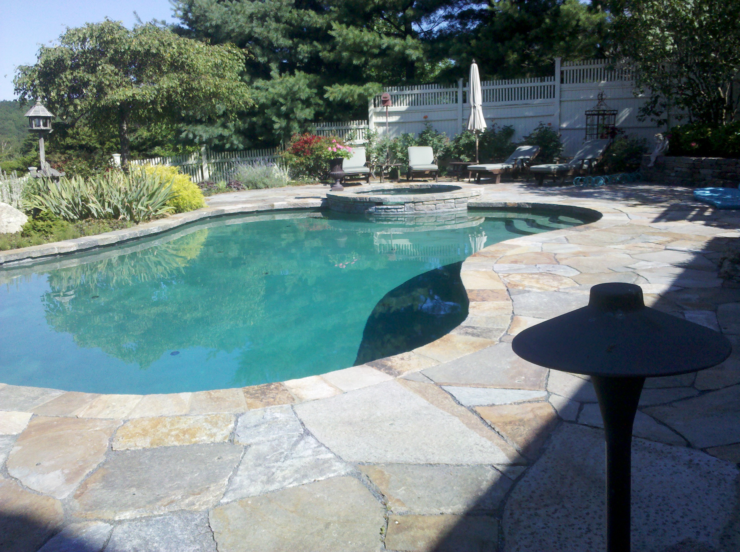 Stone masonry repair needed on this pool deck and patio. Masonry ...